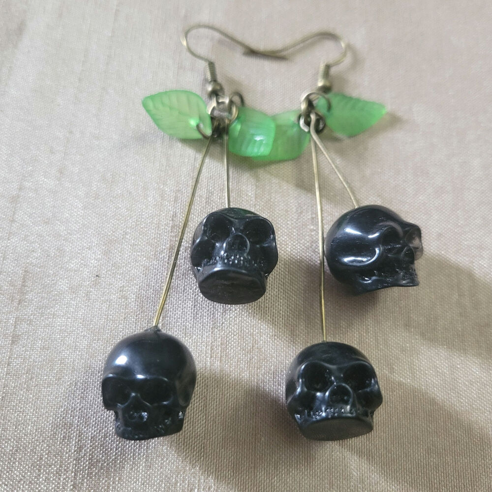Black skull shaped cherry rockabilly goth earrings
